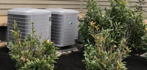 New air conditioning units installed outside a residential property 