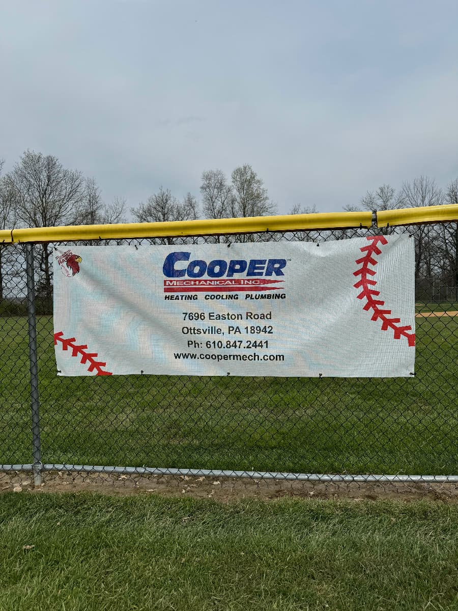 cooper-mechanical-banner-at-plumstead-baseball-field Cooper Mechanical banner at Plumstead baseball field